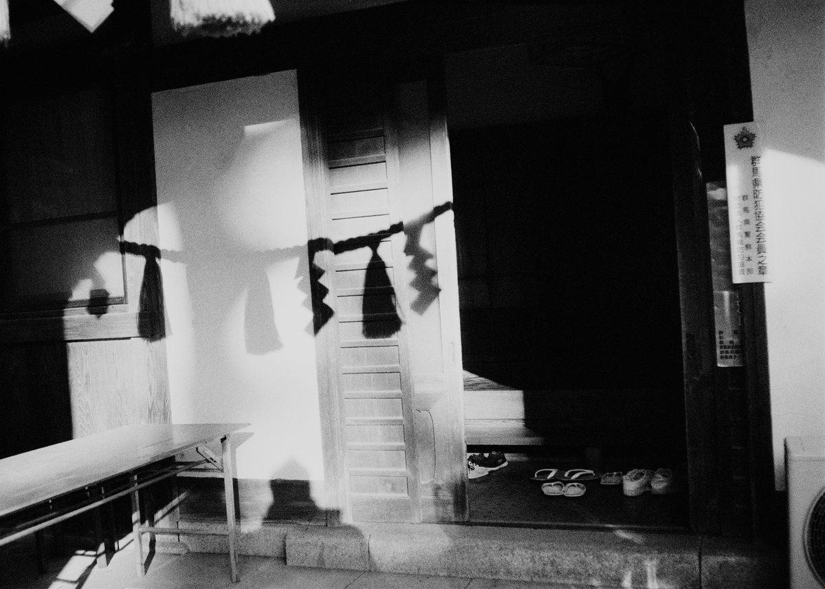 Shrine rope and shadows.